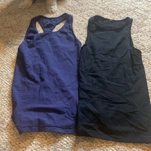 Two fabletics tanks